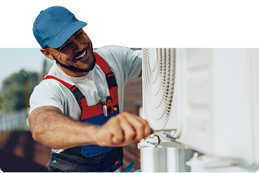 Technician repairing a wall-mounted air conditioner in a Melbourne home.